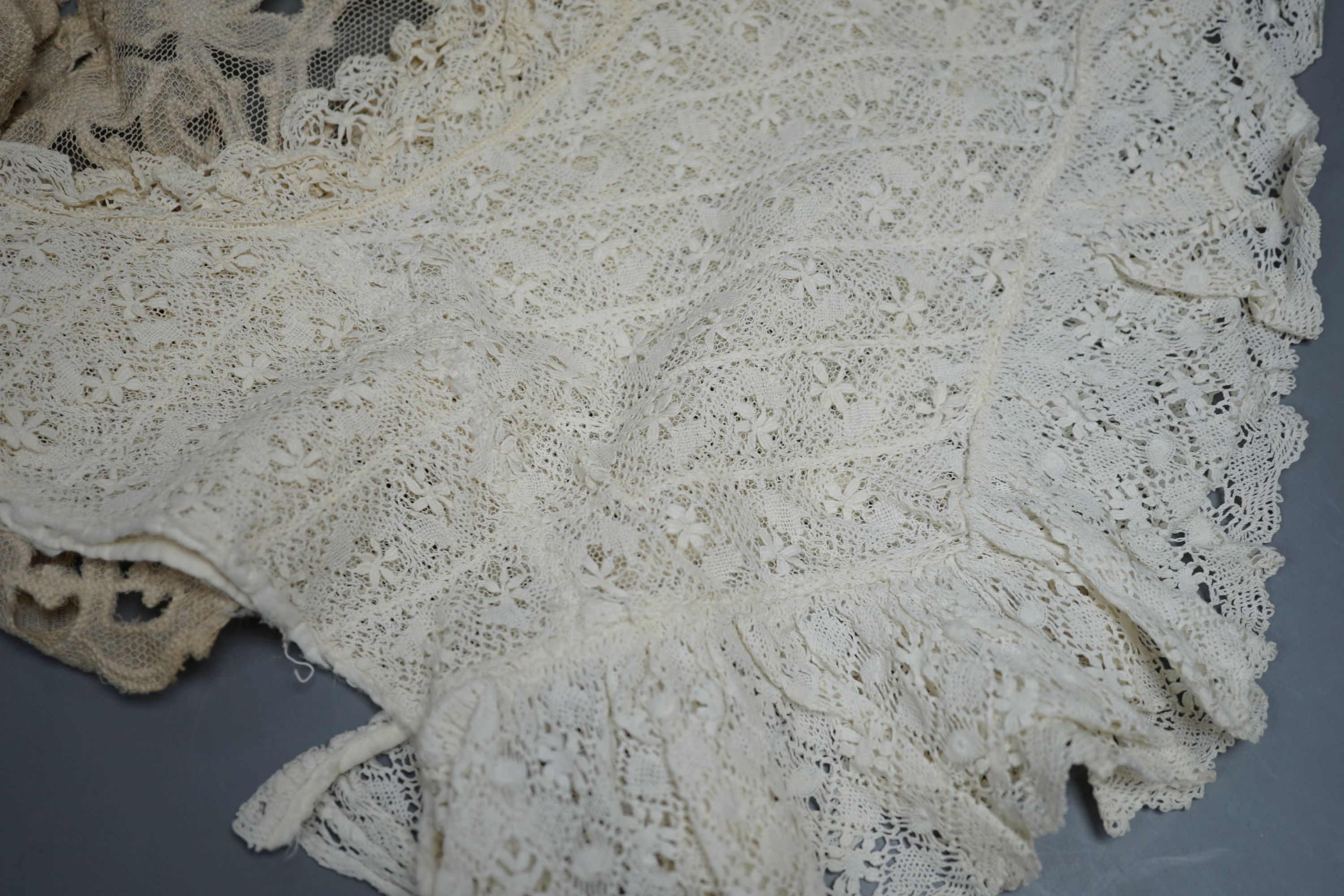 A lace bolero, a small collection of lace collars, trimmings etc